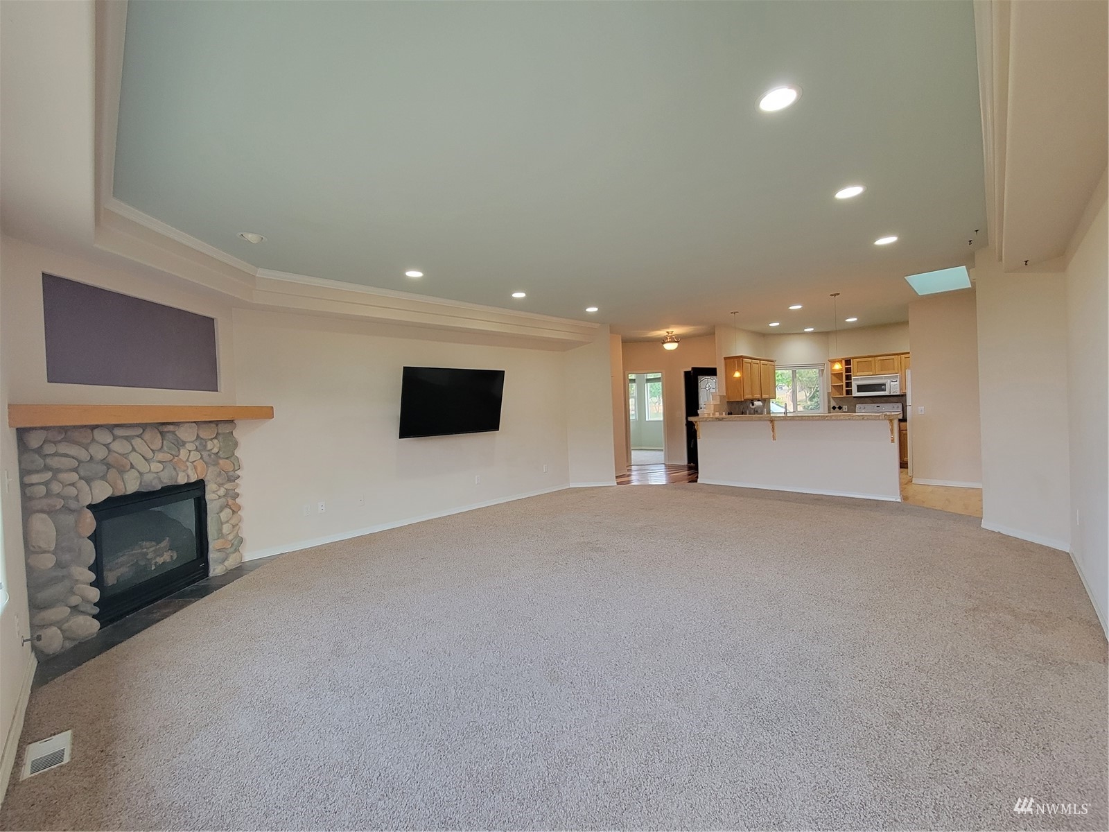 131 Les Saints Road Sequim, WA 98382 - Photo 13 of 32 a view of an empty room with a fireplace