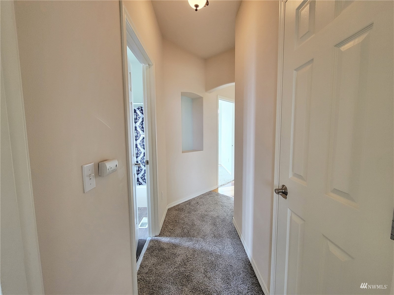 131 Les Saints Road Sequim, WA 98382 - Photo 15 of 32 a view of a livingroom from a hallway