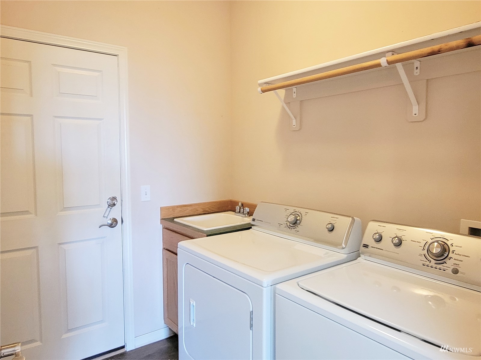 131 Les Saints Road Sequim, WA 98382 - Photo 19 of 32 a utility room with dryer and washer