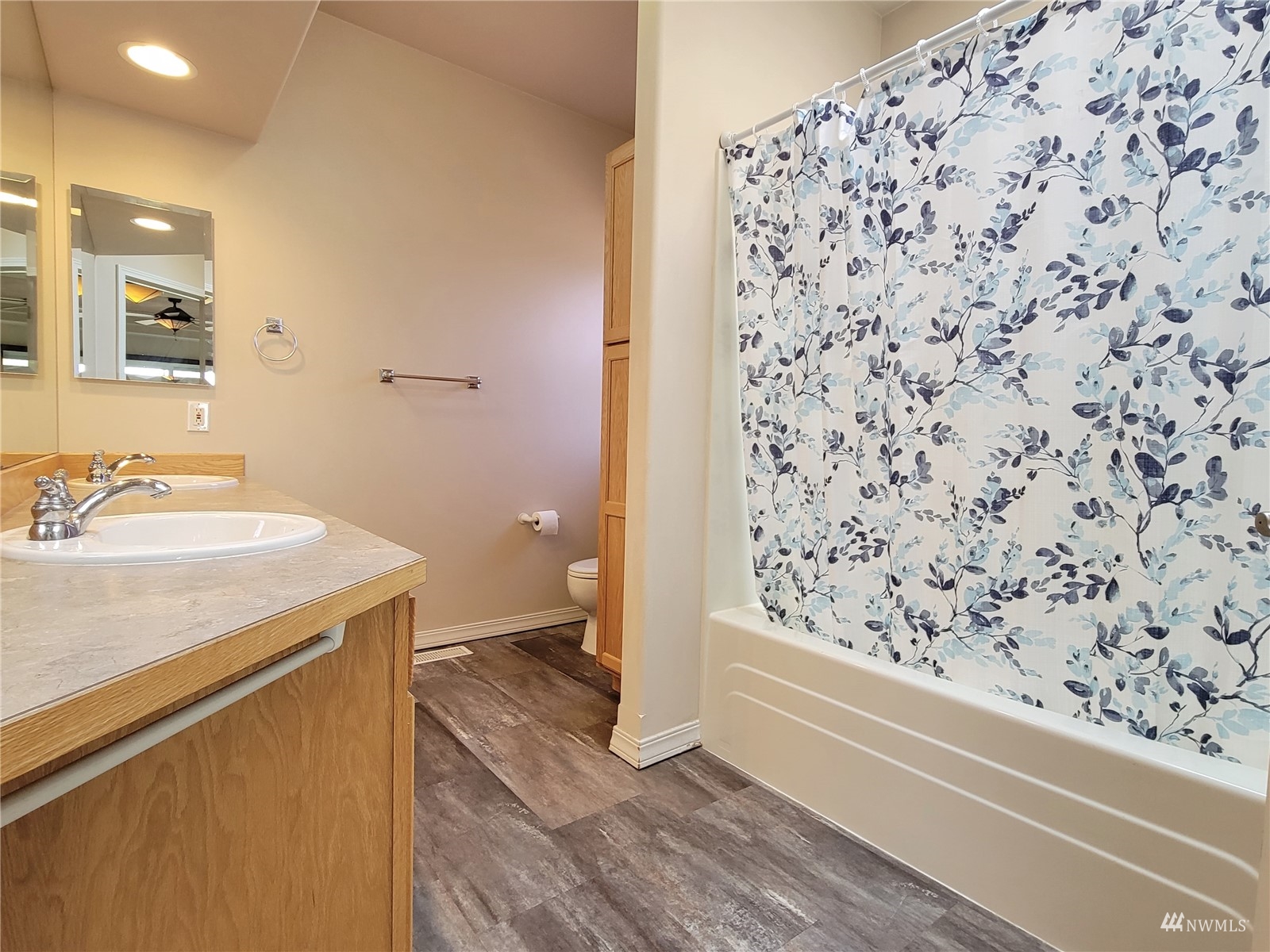 131 Les Saints Road Sequim, WA 98382 - Photo 20 of 32 a bathroom with a sink and a bathtub