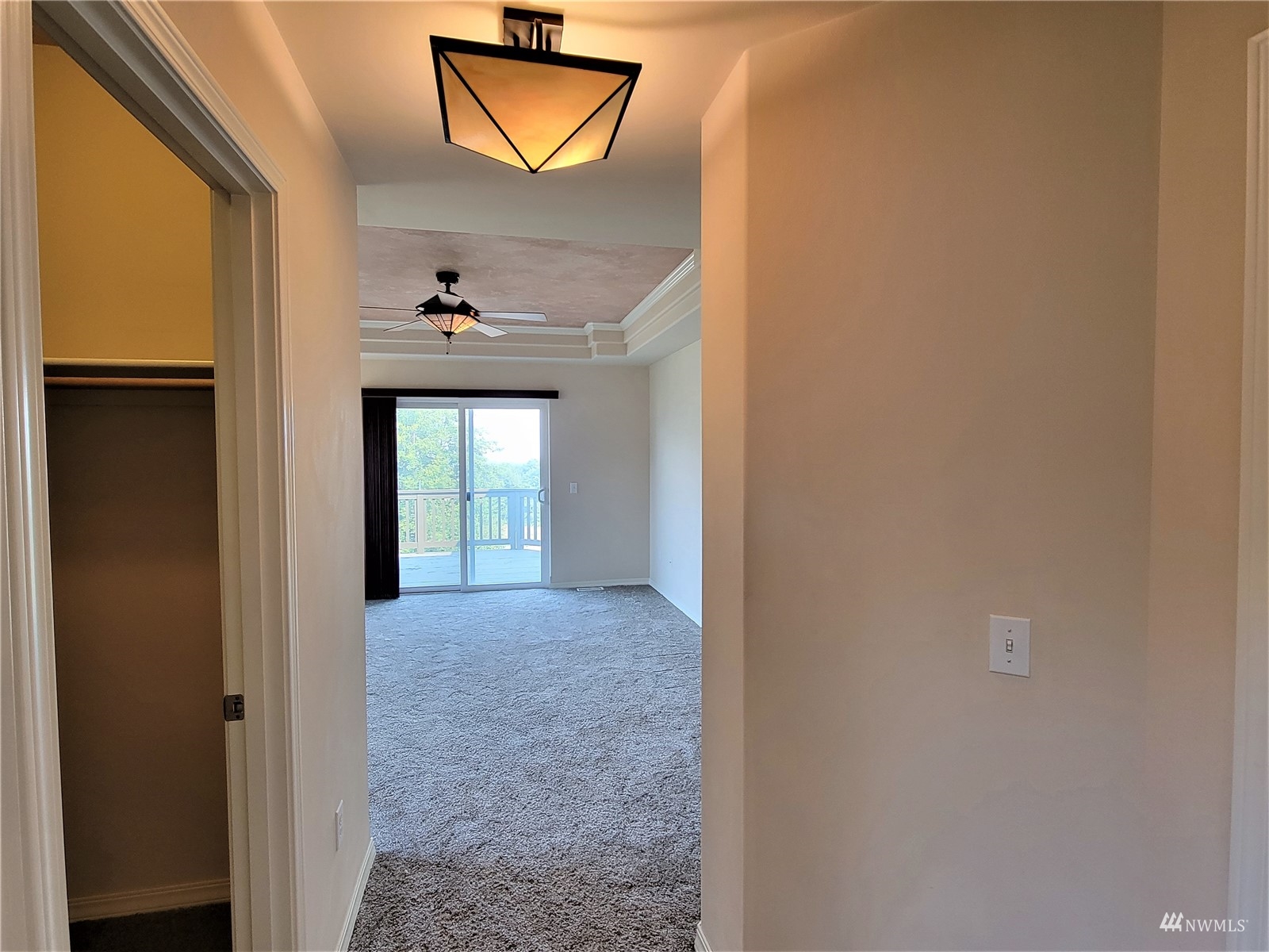131 Les Saints Road Sequim, WA 98382 - Photo 22 of 32 a view of a hallway to a window