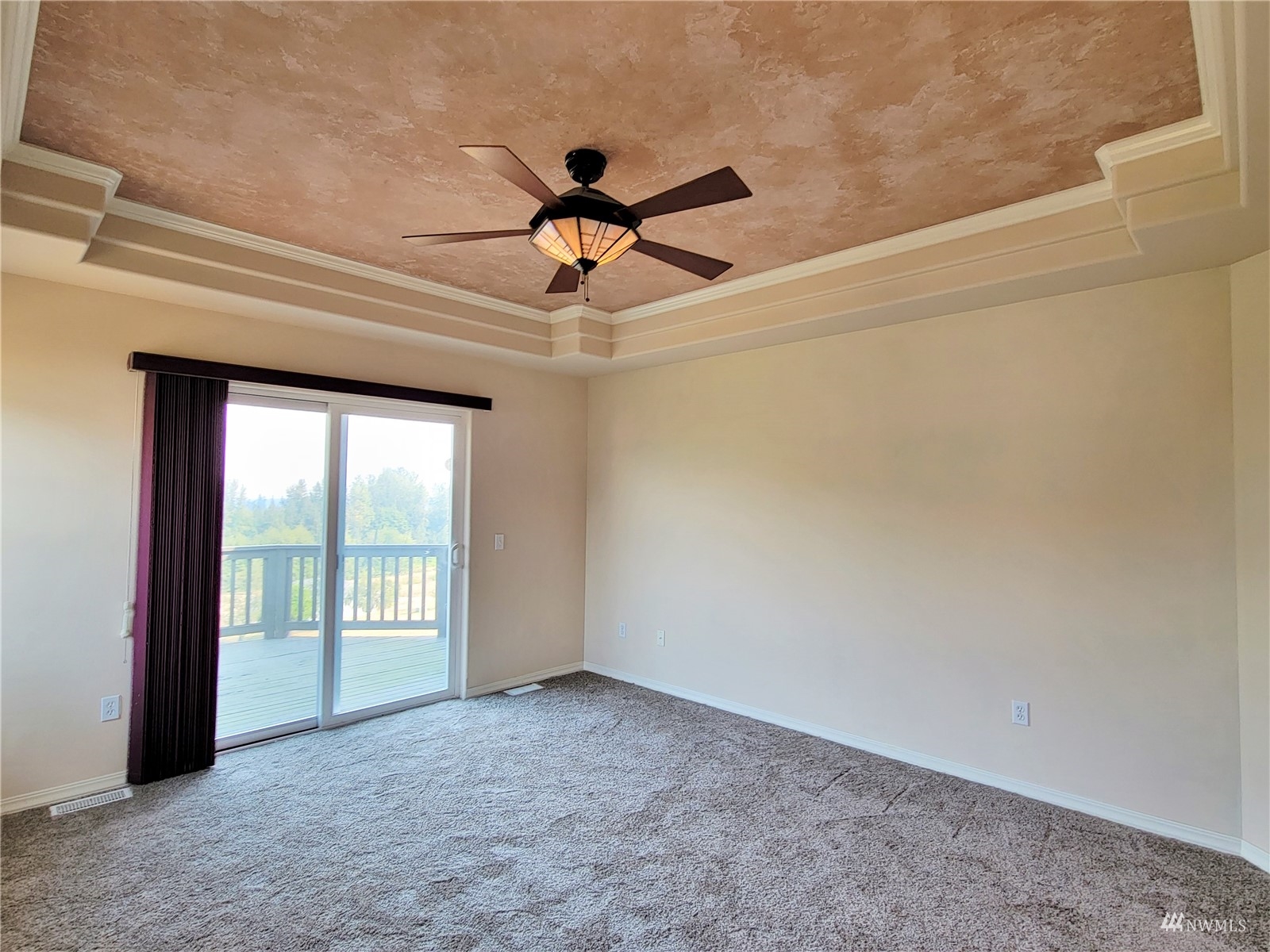 131 Les Saints Road Sequim, WA 98382 - Photo 24 of 32 a view of a livingroom with a ceiling fan and window