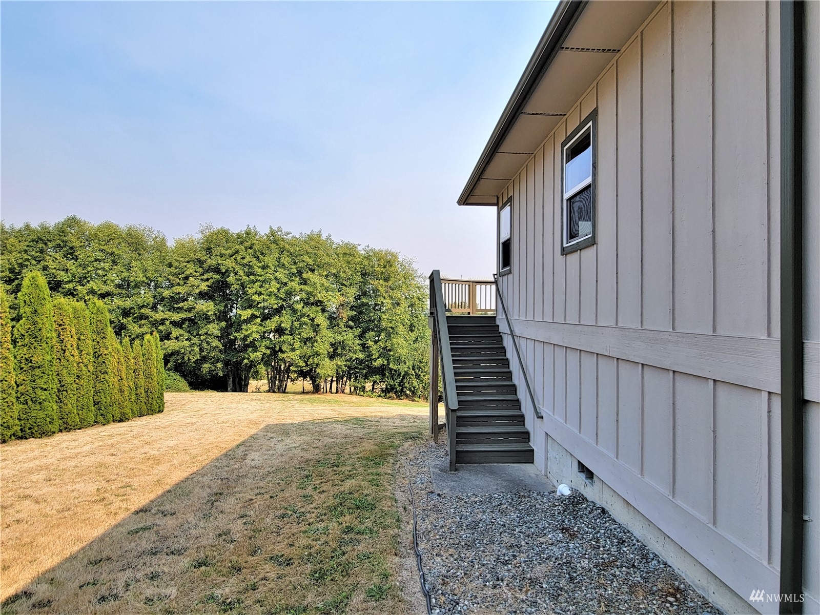 131 Les Saints Road Sequim, WA 98382 - Photo 27 of 32 a view of a backyard of the house