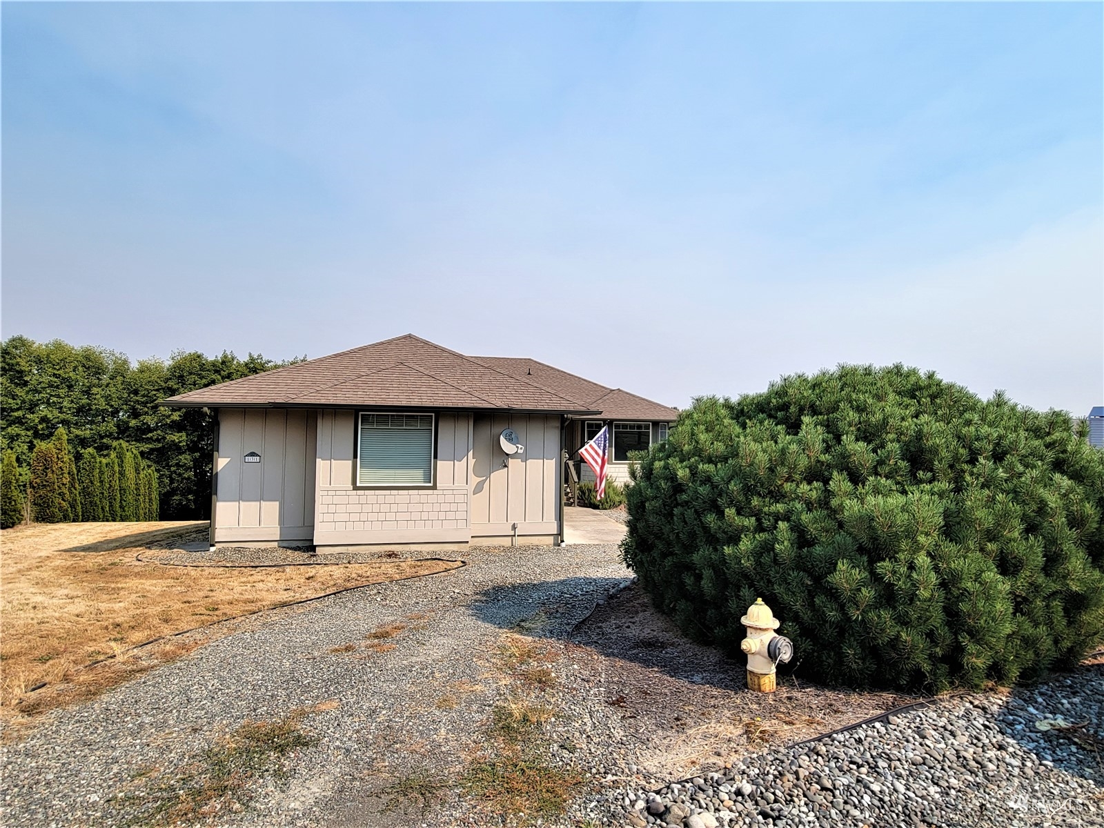 131 Les Saints Road Sequim, WA 98382 - Photo 3 of 32 a house with a outdoor space