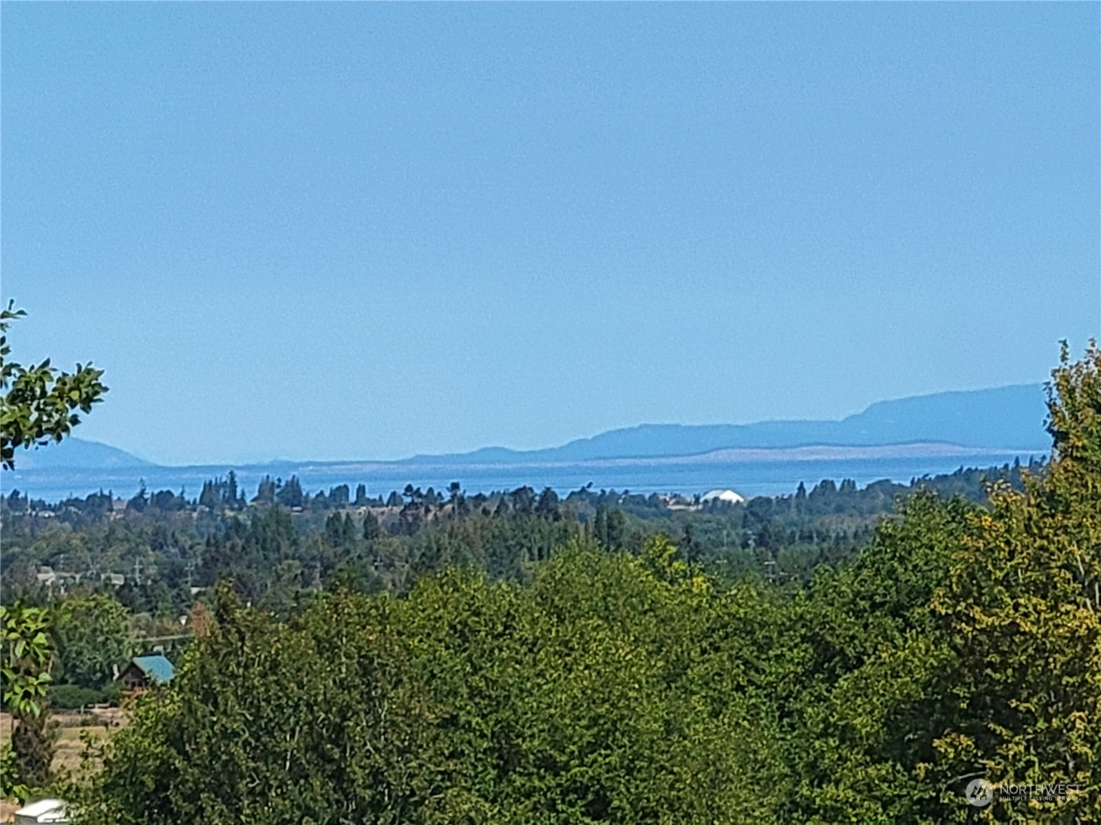 131 Les Saints Road Sequim, WA 98382 - Photo 32 of 32 an aerial view of mountain and trees