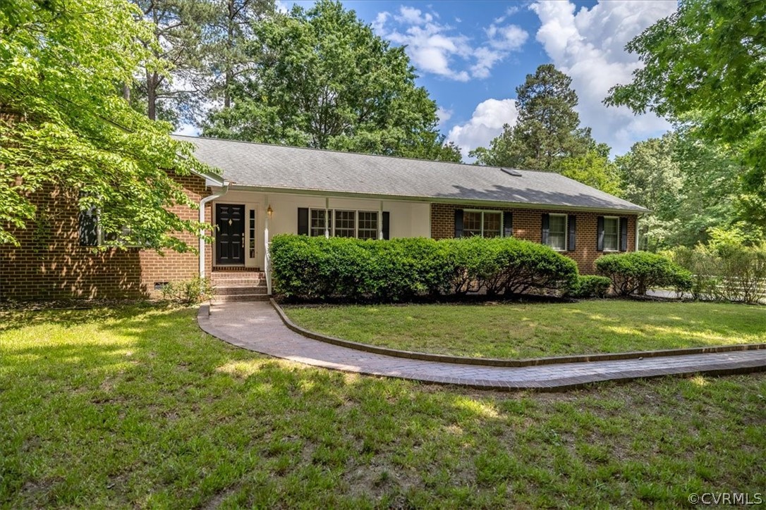 10001 North Donegal Road Midlothian, VA 23112 - Photo 1 of 1 a front view of a house with a yard