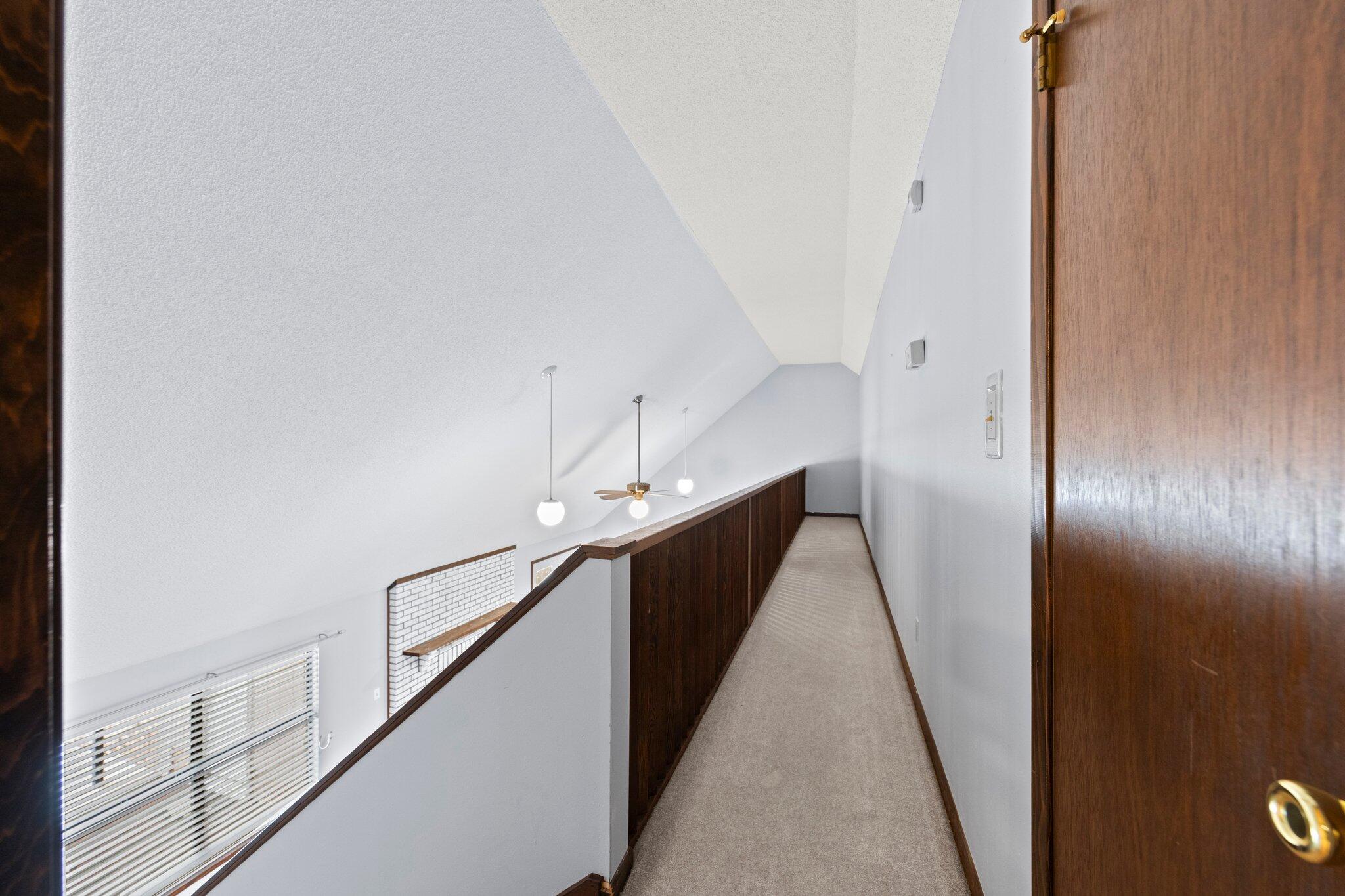 466 Olde Post Road Niceville, FL 32578 - Photo 29 of 49 a hallway with windows