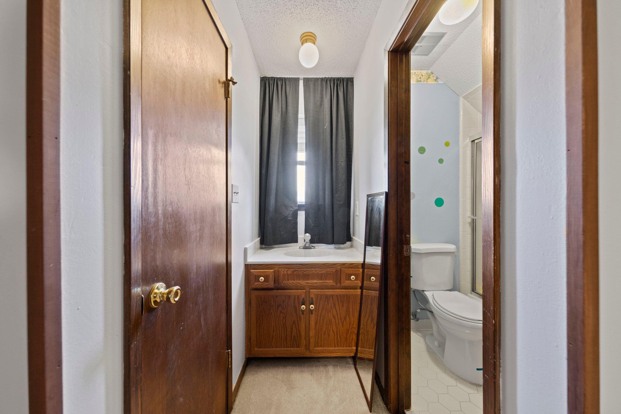 466 Olde Post Road Niceville, FL 32578 - Photo 31 of 49 a bathroom with a glass door shower and a sink