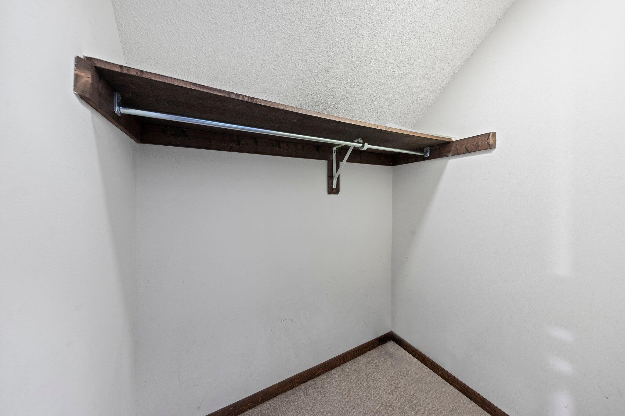 466 Olde Post Road Niceville, FL 32578 - Photo 33 of 49 a view of storage and utility room with racks on the wall