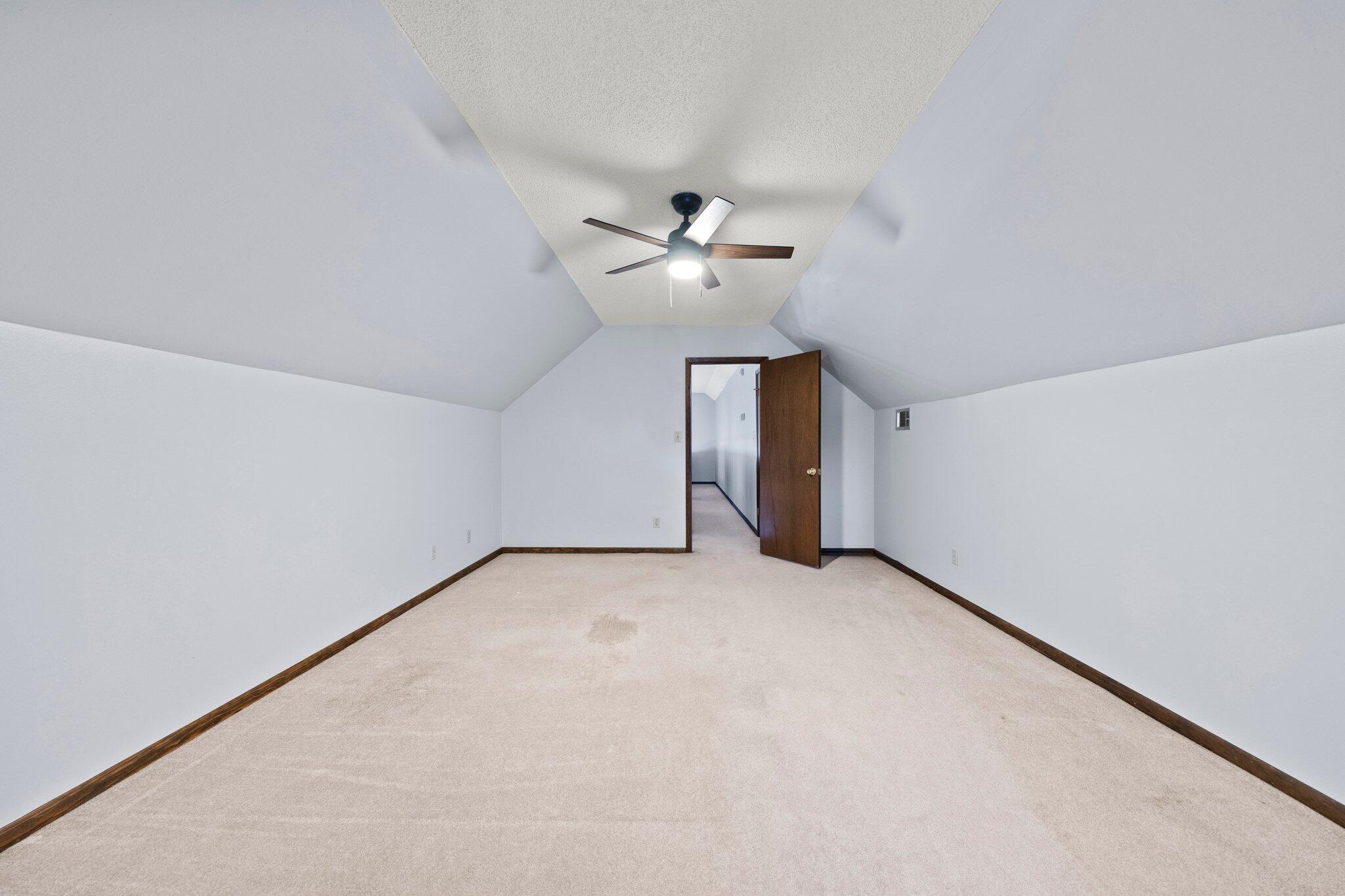 466 Olde Post Road Niceville, FL 32578 - Photo 34 of 49 an empty room with a ceiling fan and a window