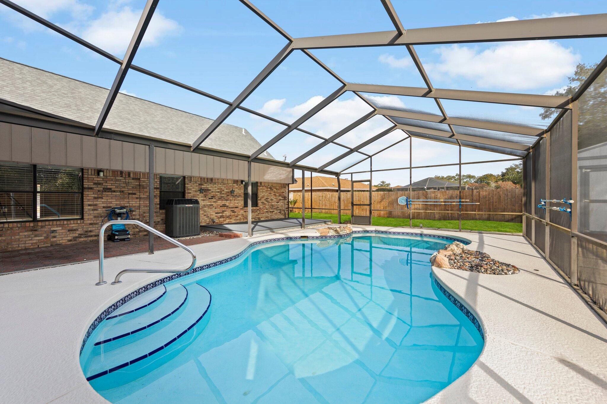 466 Olde Post Road Niceville, FL 32578 - Photo 40 of 49 a view of a swimming pool with a patio