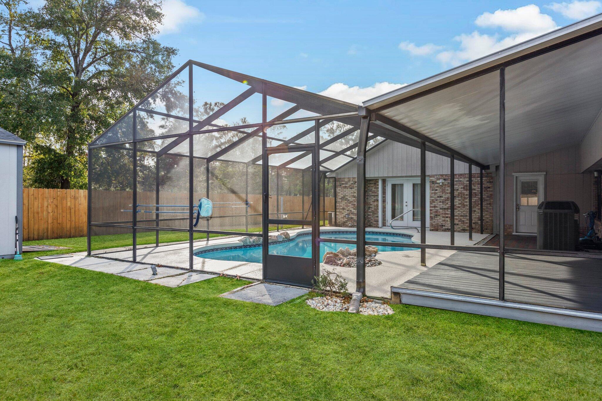 466 Olde Post Road Niceville, FL 32578 - Photo 43 of 49 a view of a backyard with a slide