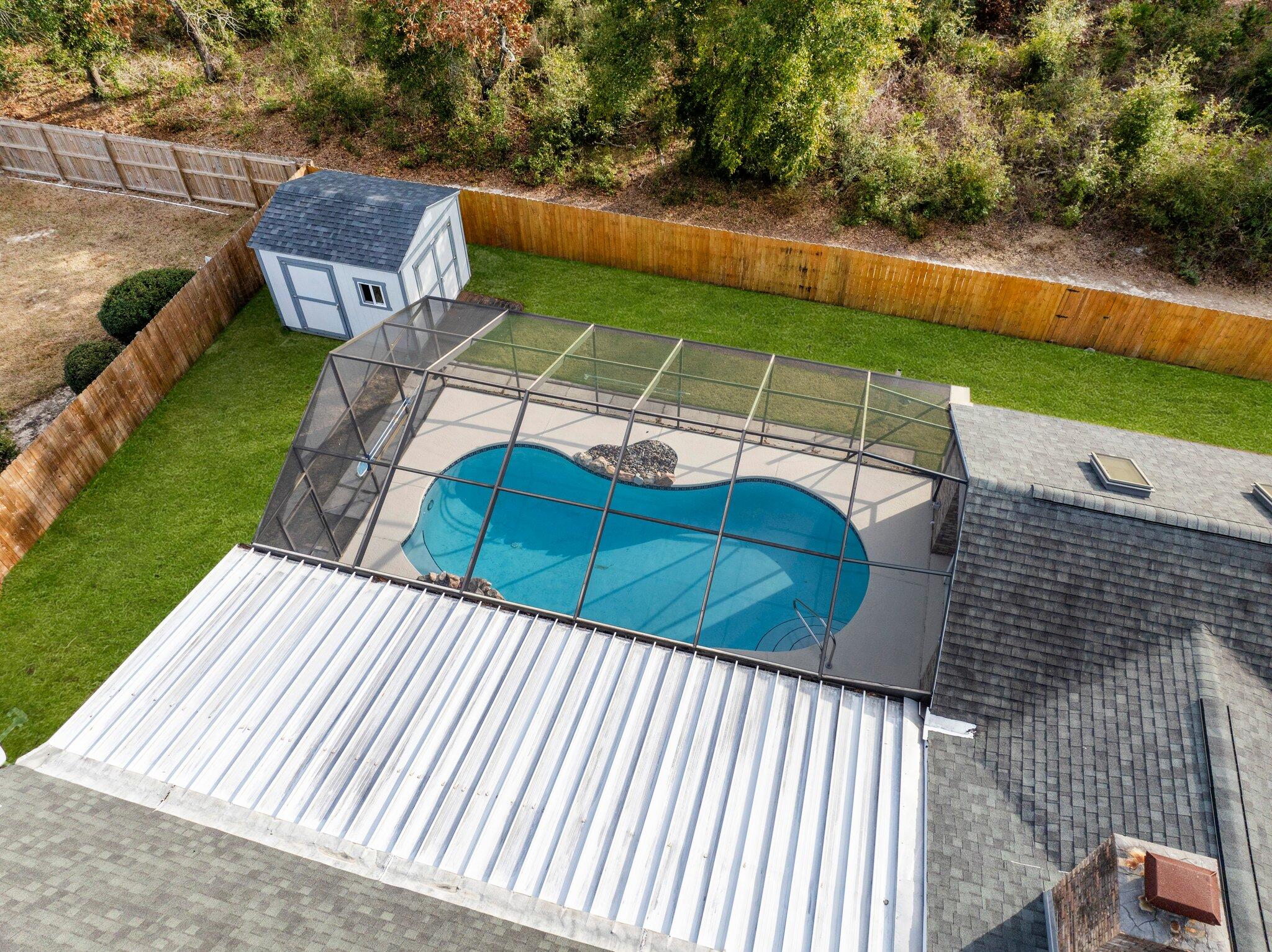 466 Olde Post Road Niceville, FL 32578 - Photo 46 of 49 a view of a backyard with sitting area