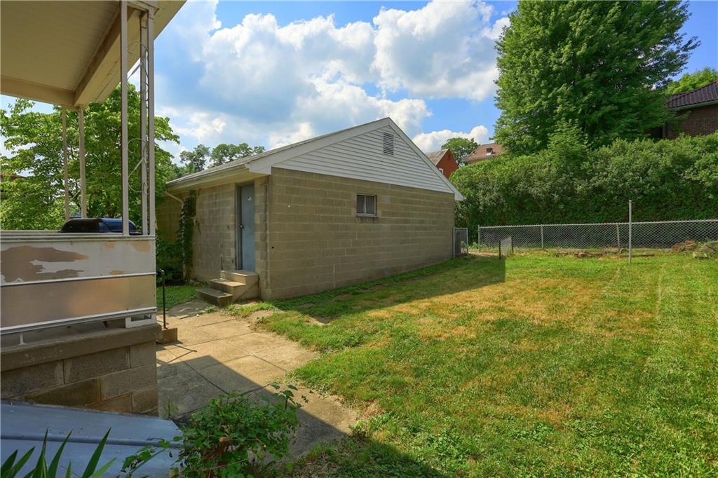 849 Hober Avenue McKees Rocks, PA 15136 - Photo 23 of 24 Back porch, rear yard and garage.