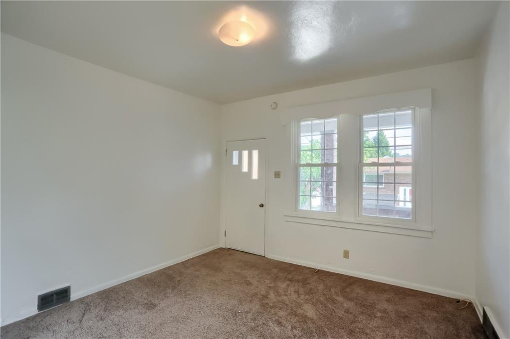 849 Hober Avenue McKees Rocks, PA 15136 - Photo 4 of 24 The living room is 12x12