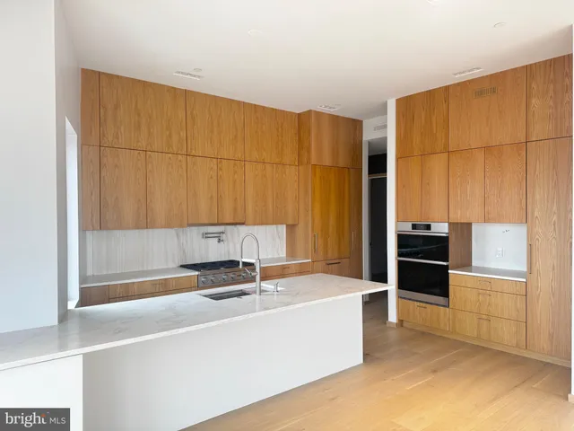 a bathroom with a bathtub and a sink