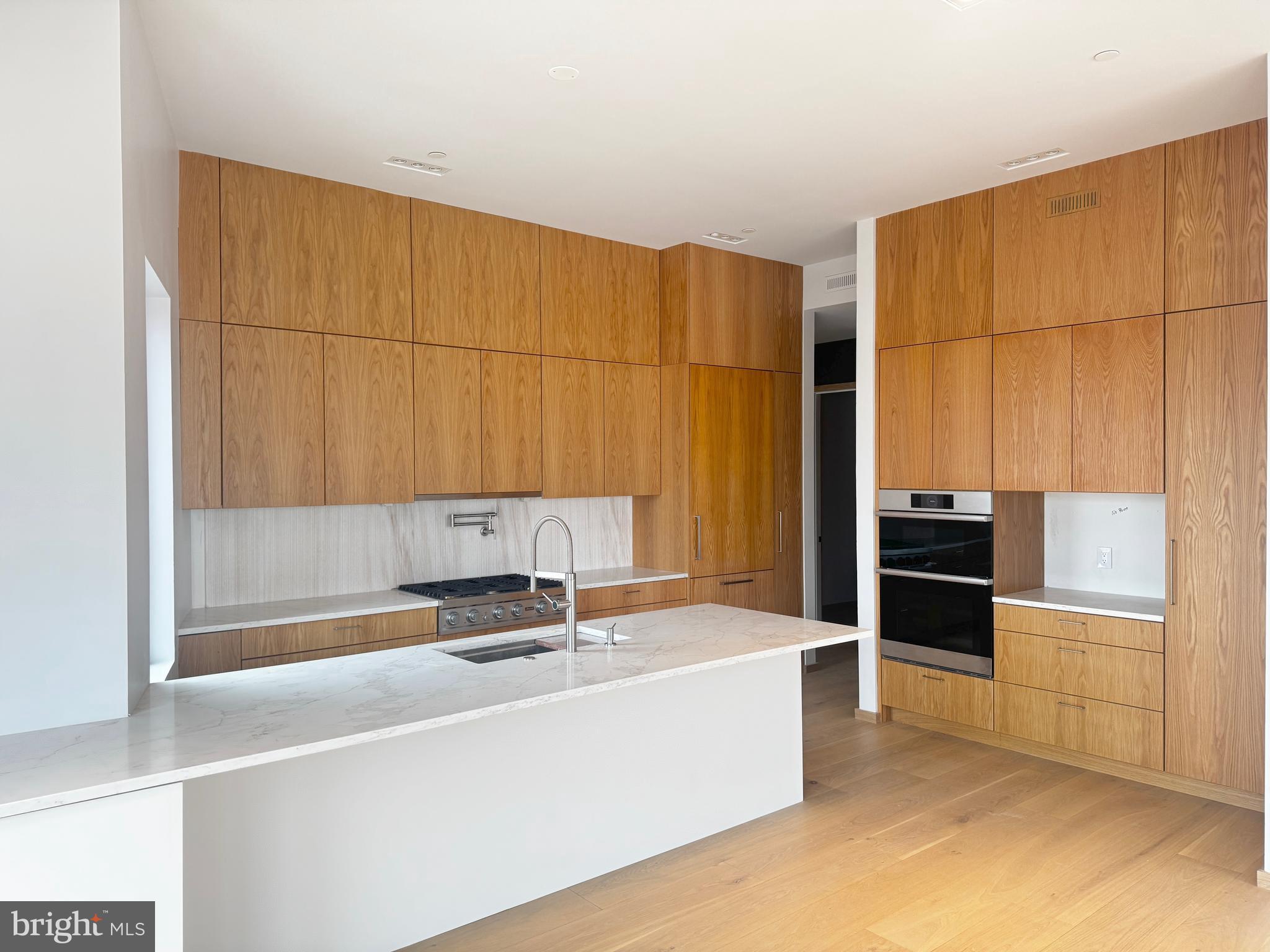 617 South 24th Street, Unit 501 Philadelphia, PA 19146 - Photo 11 of 36 a bathroom with a bathtub and a sink
