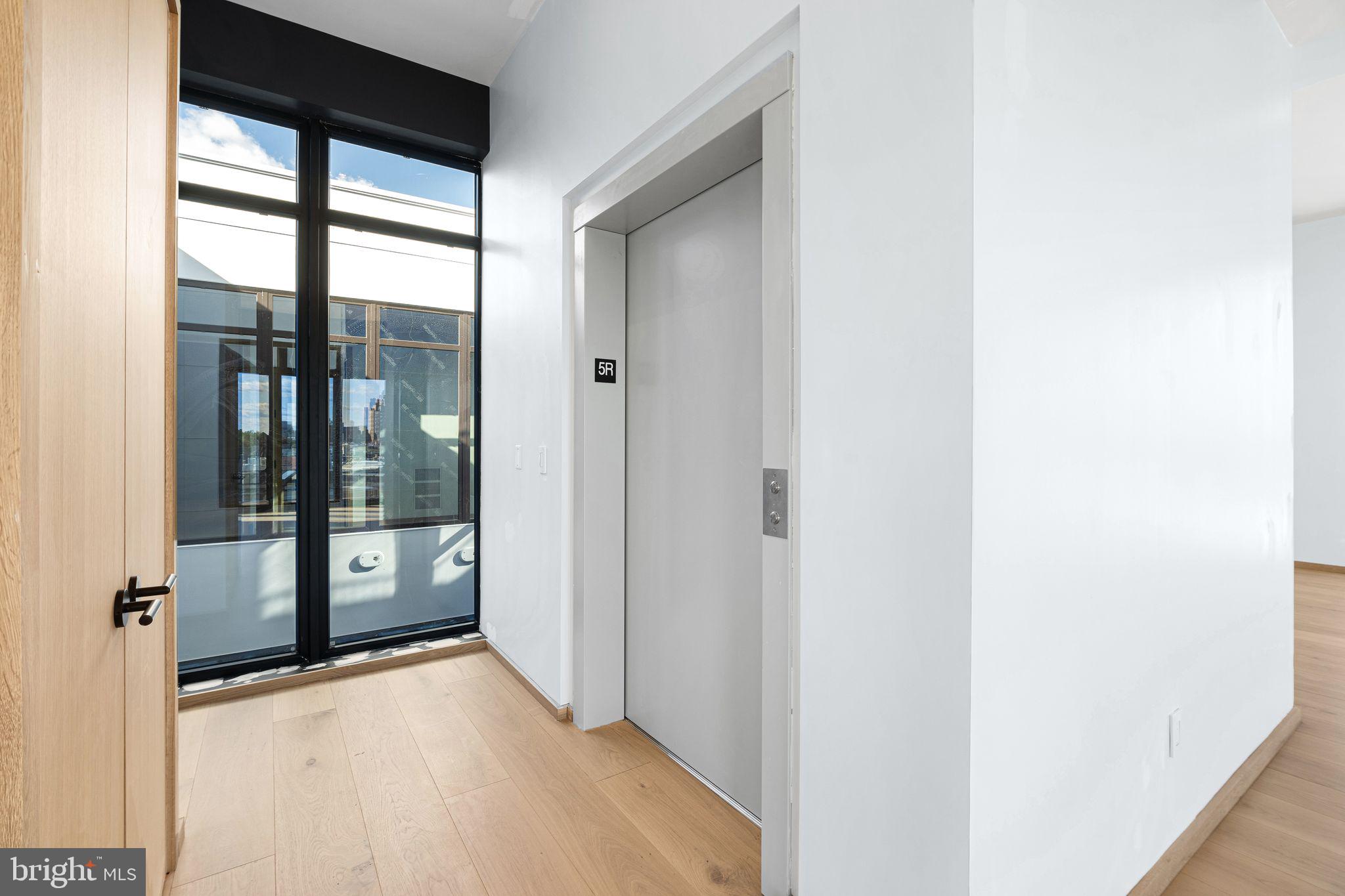 617 South 24th Street, Unit 501 Philadelphia, PA 19146 - Photo 15 of 36 a view of a glass door with a glass door