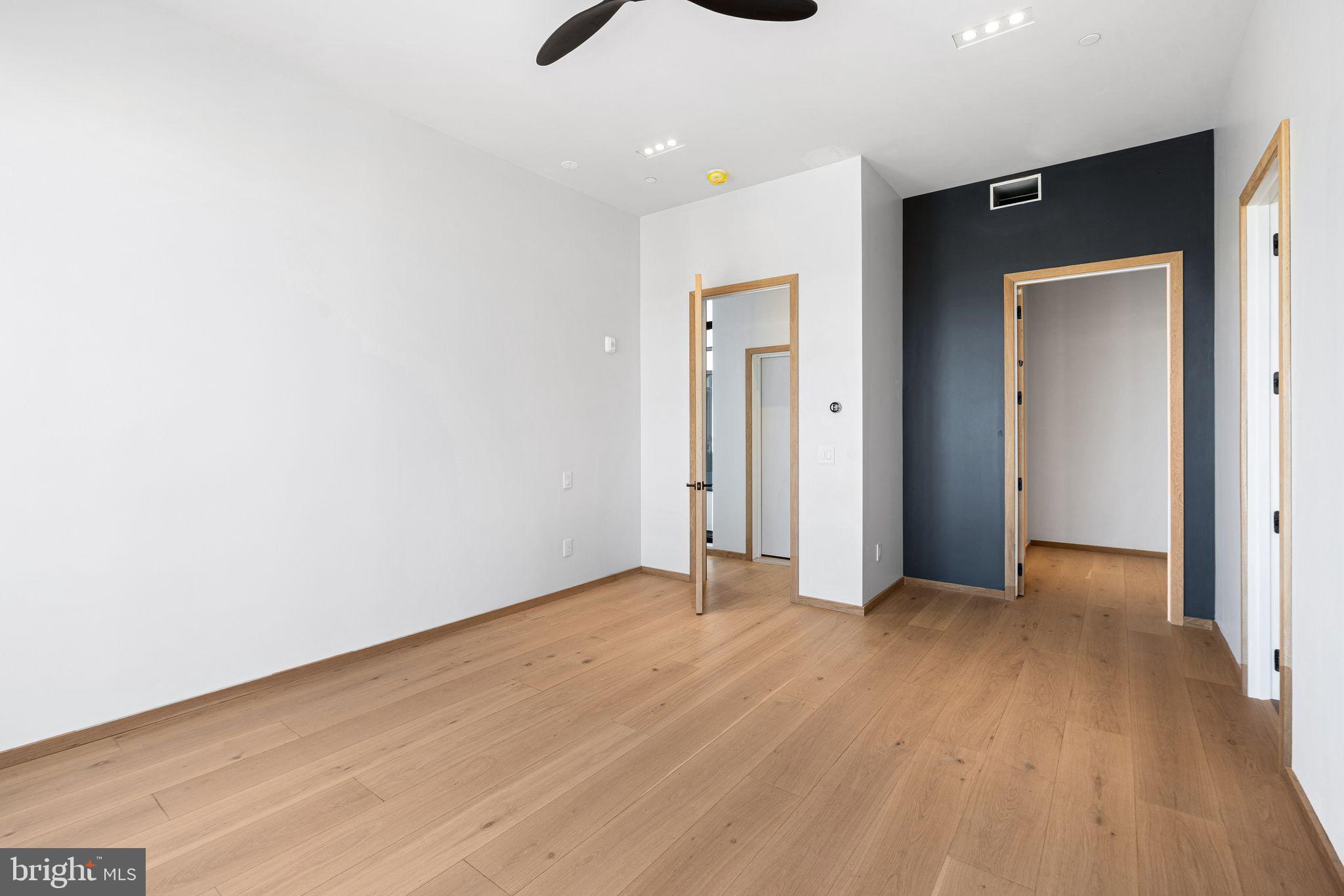 617 South 24th Street, Unit 501 Philadelphia, PA 19146 - Photo 20 of 36 a view of an empty room with wooden floor