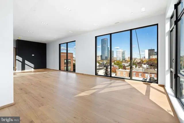 a view of an empty room and window