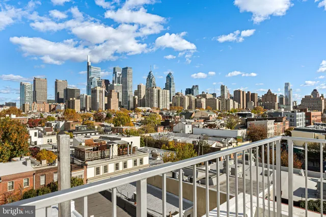 a view of a city with tall buildings