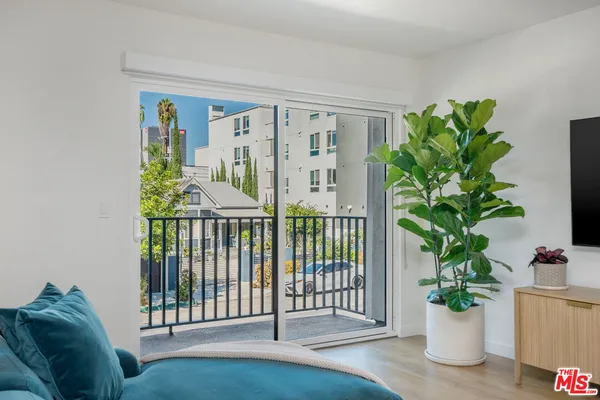 a view of entryway with wooden floor