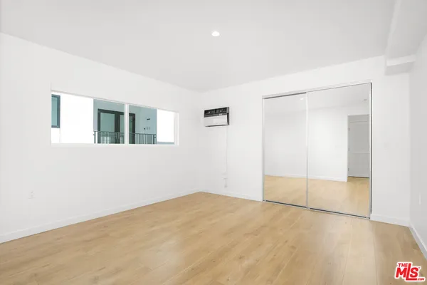 an empty room with a natural light