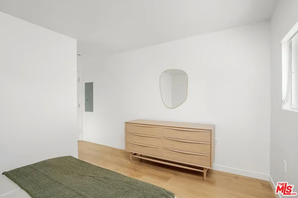 a view of a room with stairs and a table