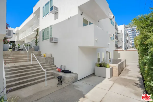 a view of an empty room with a fireplace