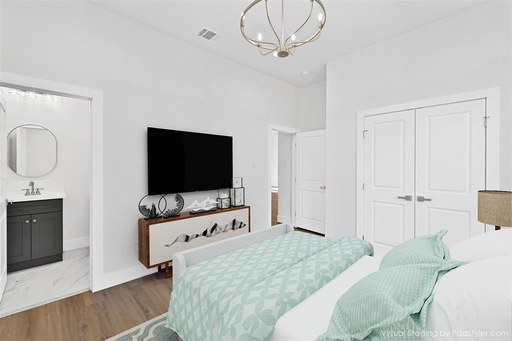 360 Dalton Road Canton, TX 75103 - Photo 12 of 23 a bedroom with a bed and a flat tv screen on dresser