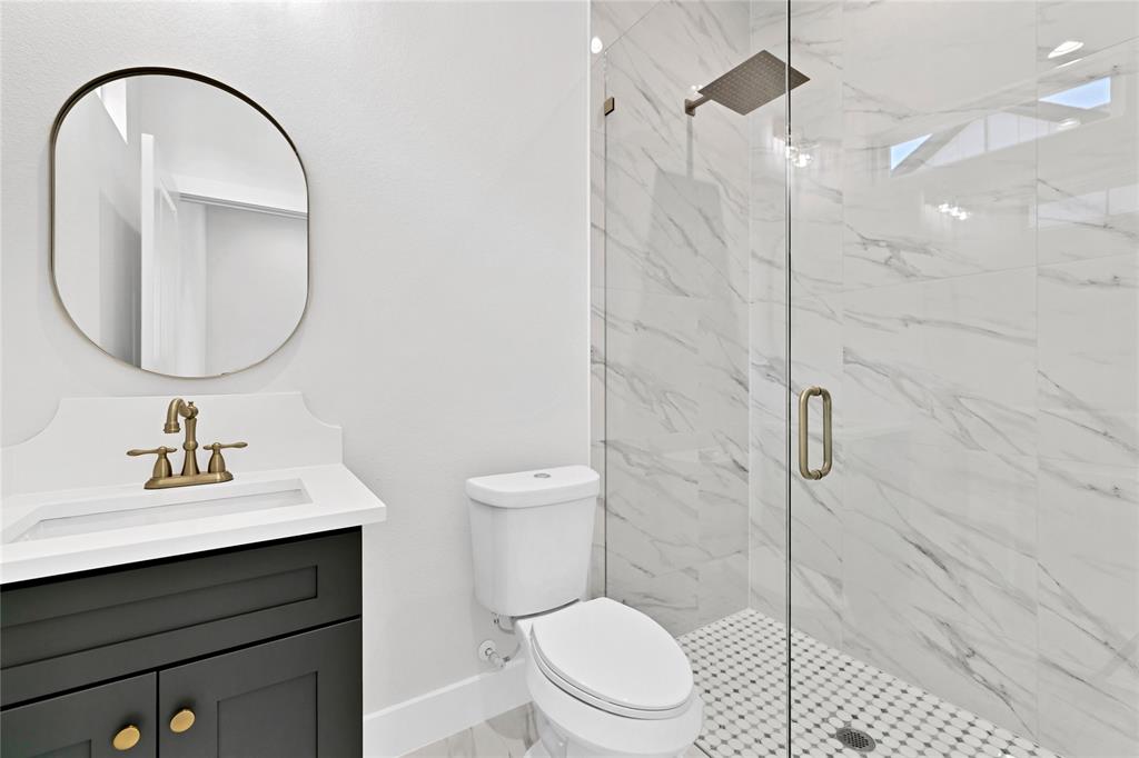 360 Dalton Road Canton, TX 75103 - Photo 13 of 23 a bathroom with a sink toilet and a mirror