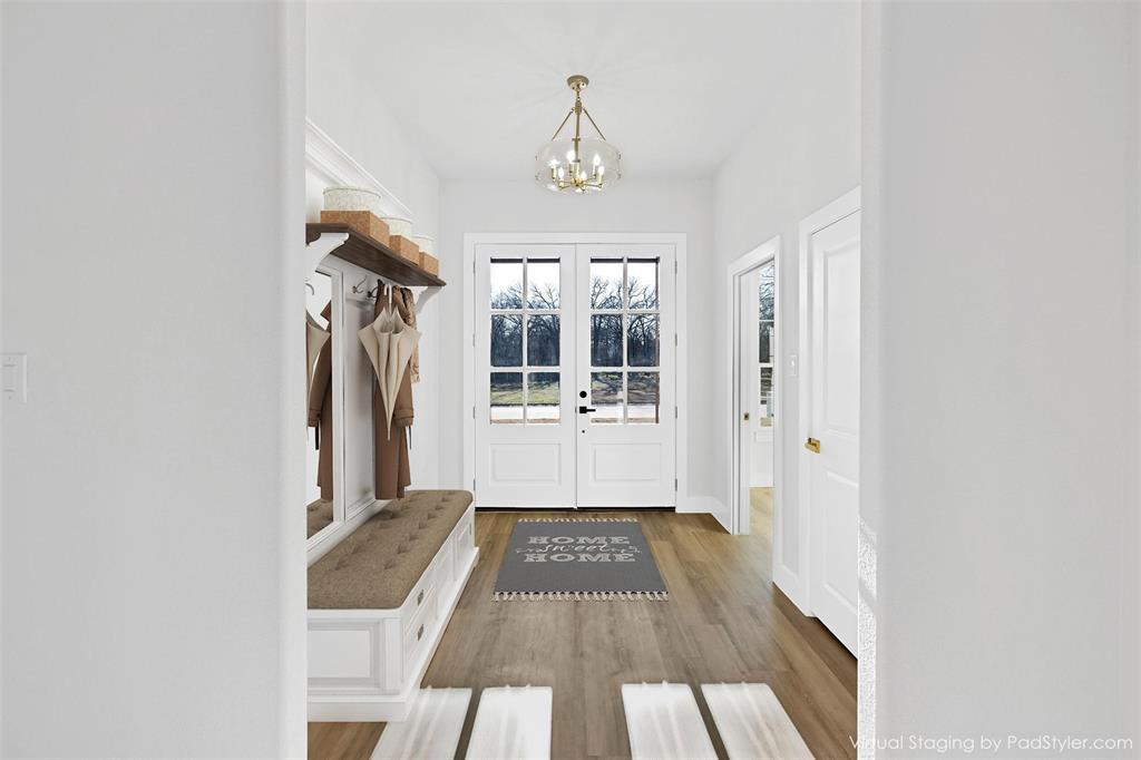 360 Dalton Road Canton, TX 75103 - Photo 2 of 23 a view of a hallway view with wooden floor and staircase