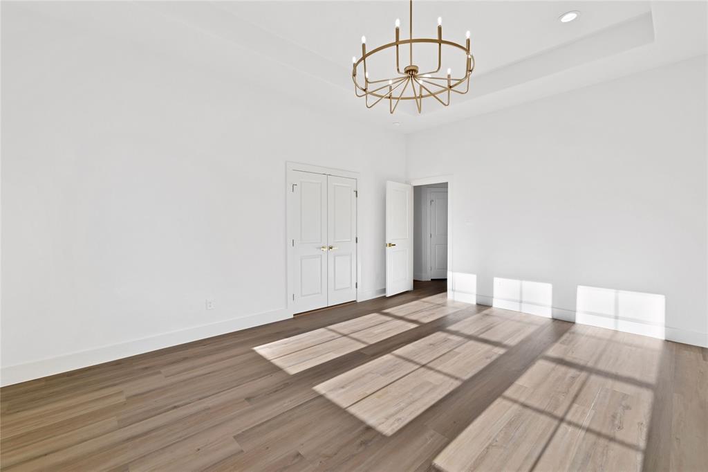 360 Dalton Road Canton, TX 75103 - Photo 21 of 23 a view of a room with wooden floor and white walls