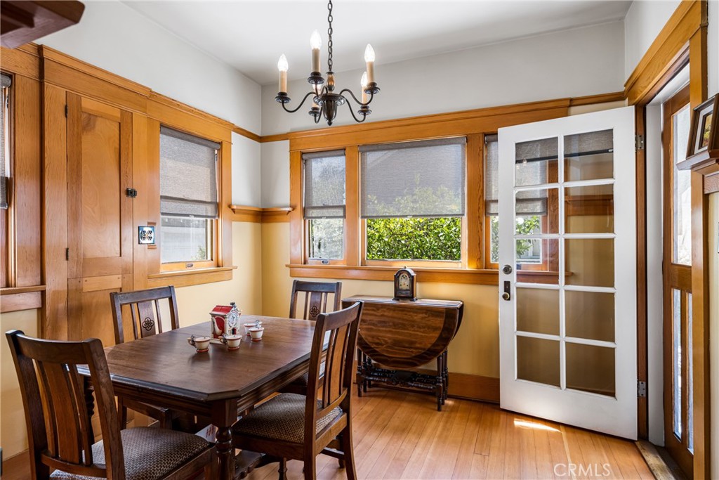 155 North Cleveland Street Orange, CA 92866 - Photo 15 of 39 a view of a dining room with furniture window and wooden floor