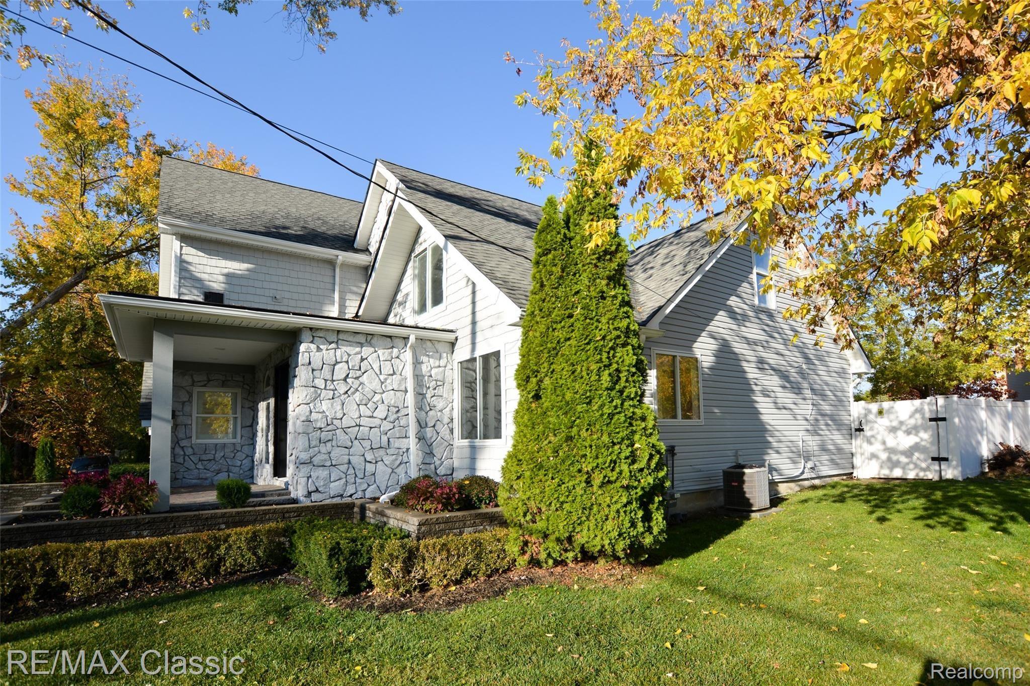 321 Leon Road Walled Lake, MI 48390 - Photo 45 of 53 Side View