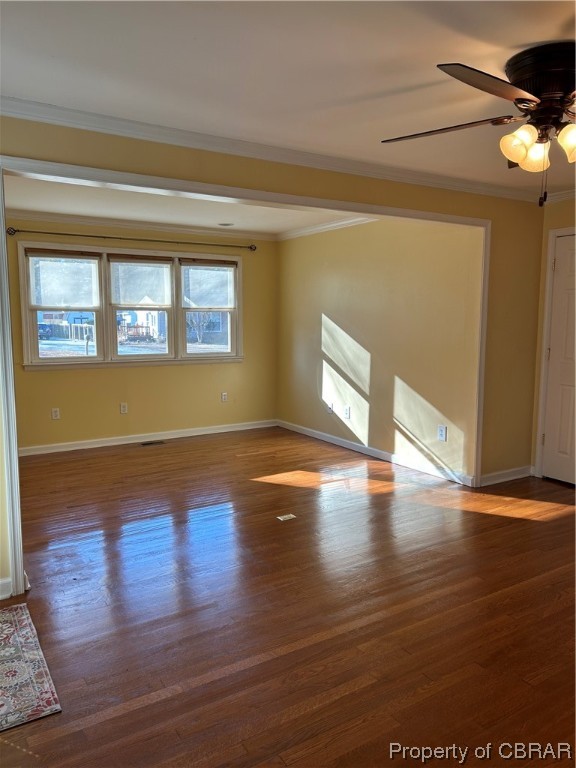 1489 Laurens Road Gloucester Point, VA 23062 - Photo 14 of 43 Unfurnished room featuring dark hardwood / wood-style flooring, ornamental molding, and ceiling fan