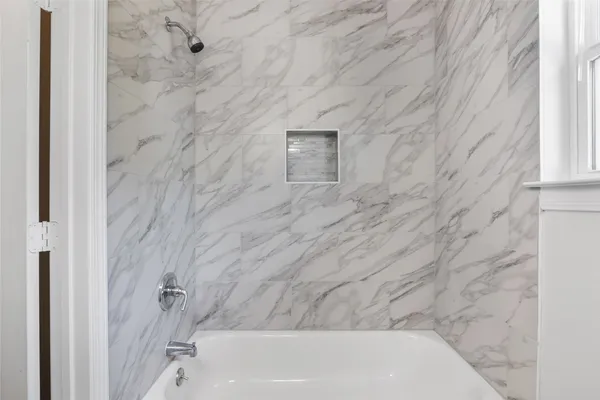 a bathroom with a bathtub
