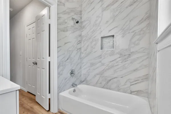 a bathroom with a bathtub