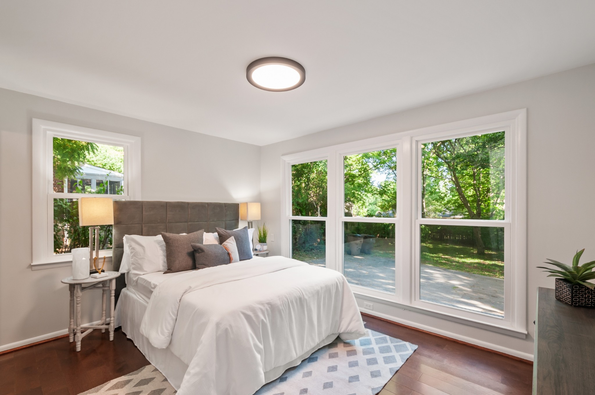 549 Elysian Fields Road Nashville, TN 37211 - Photo 8 of 17 a bedroom with a large bed and a large window