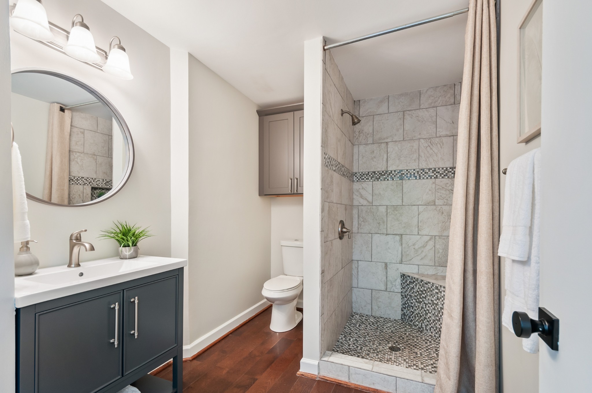 549 Elysian Fields Road Nashville, TN 37211 - Photo 10 of 17 a bathroom with a double vanity sink toilet and shower
