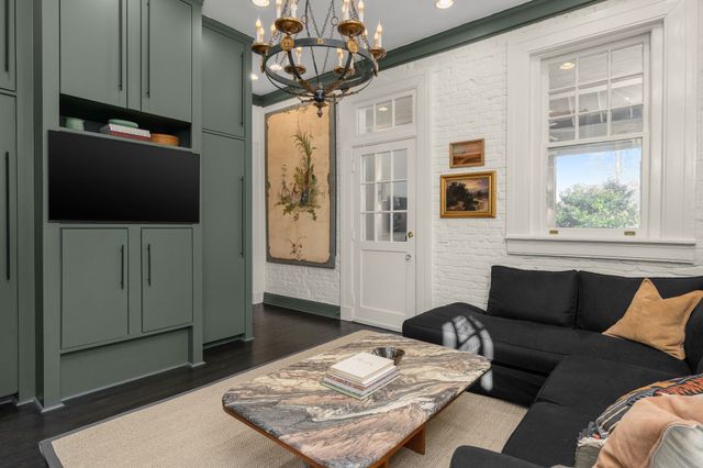 a view of house with a yard