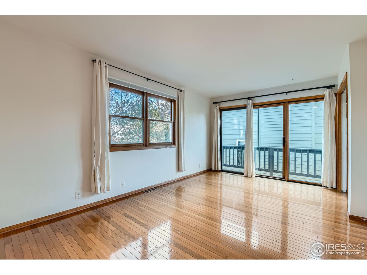 4150 Riverside Avenue Boulder, CO 80304 - Photo 9 of 40 wooden floor in an empty room with a window