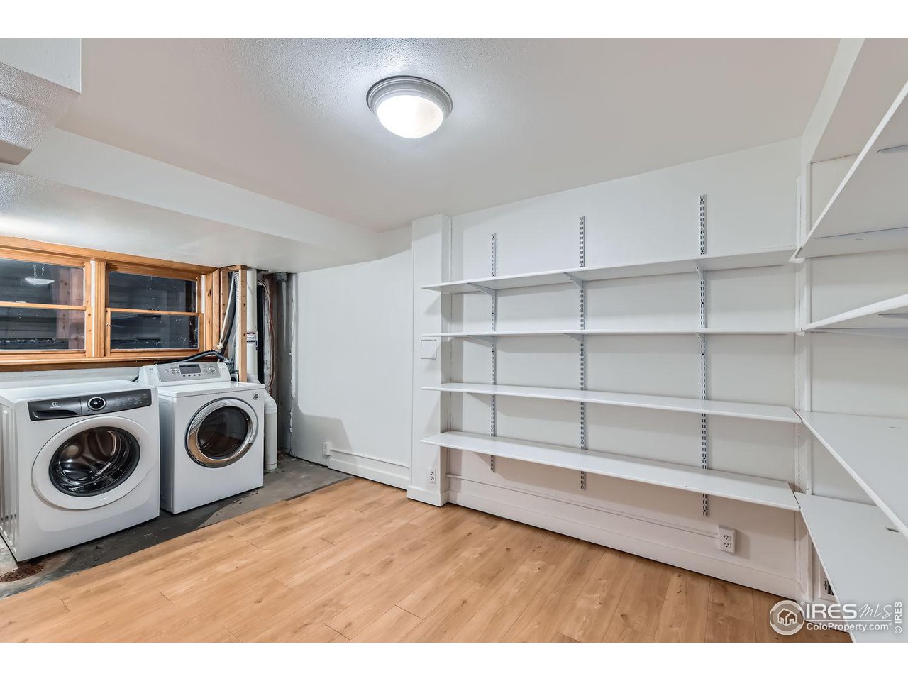 4150 Riverside Avenue Boulder, CO 80304 - Photo 17 of 40 a view of a storage & utility room with washer and dryer