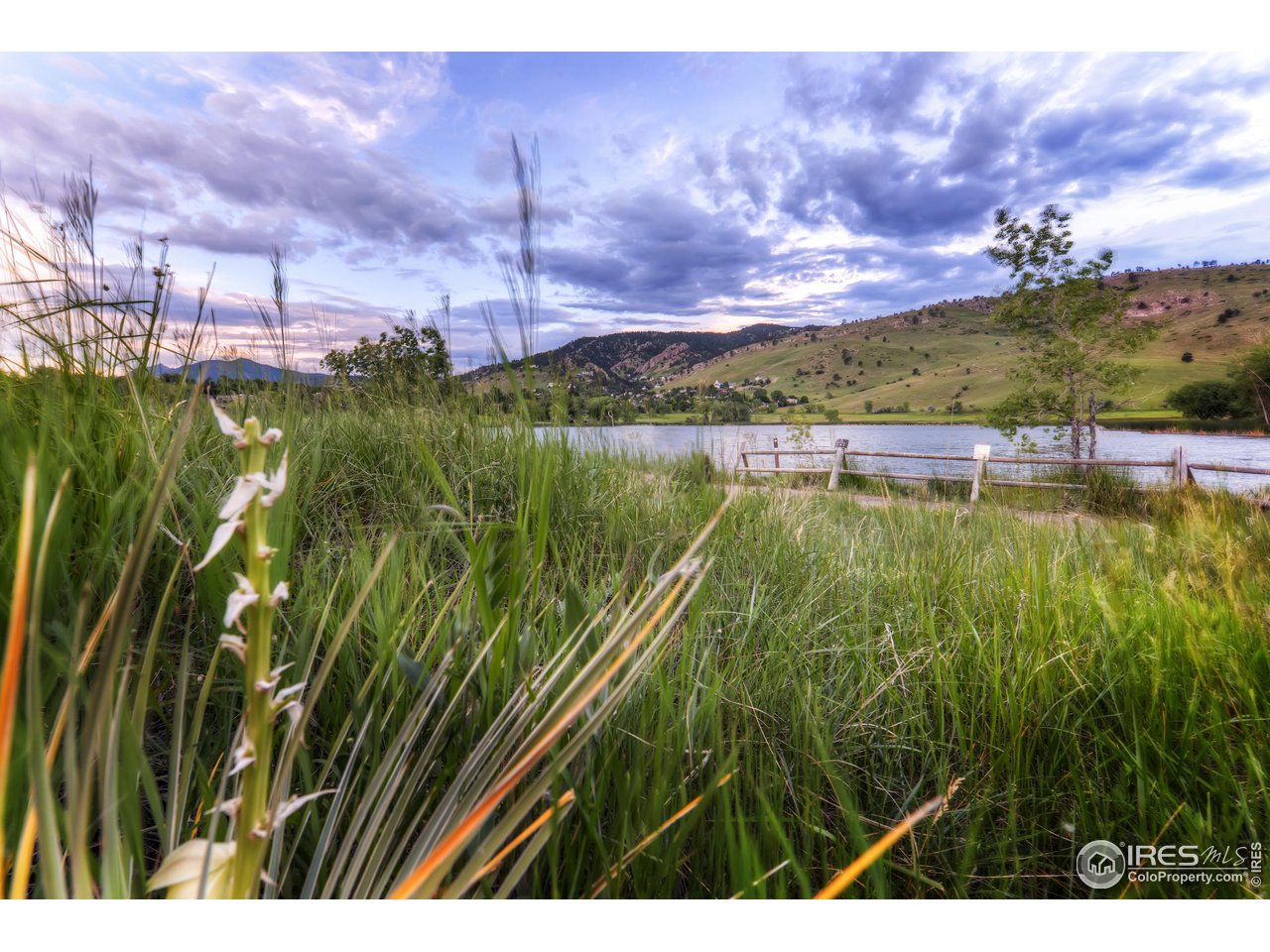 4150 Riverside Avenue Boulder, CO 80304 - Photo 28 of 40 a view of a lake with a yard