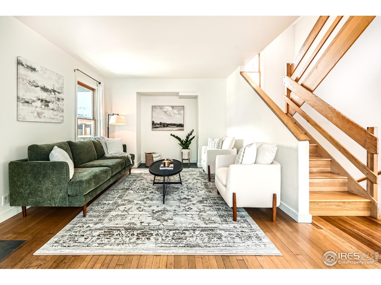 4150 Riverside Avenue Boulder, CO 80304 - Photo 3 of 40 a living room with furniture and a rug