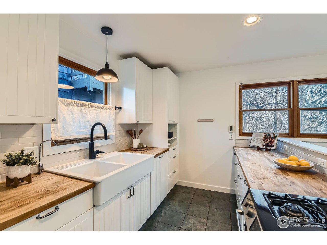 4150 Riverside Avenue Boulder, CO 80304 - Photo 4 of 40 a kitchen with sink cabinets and window