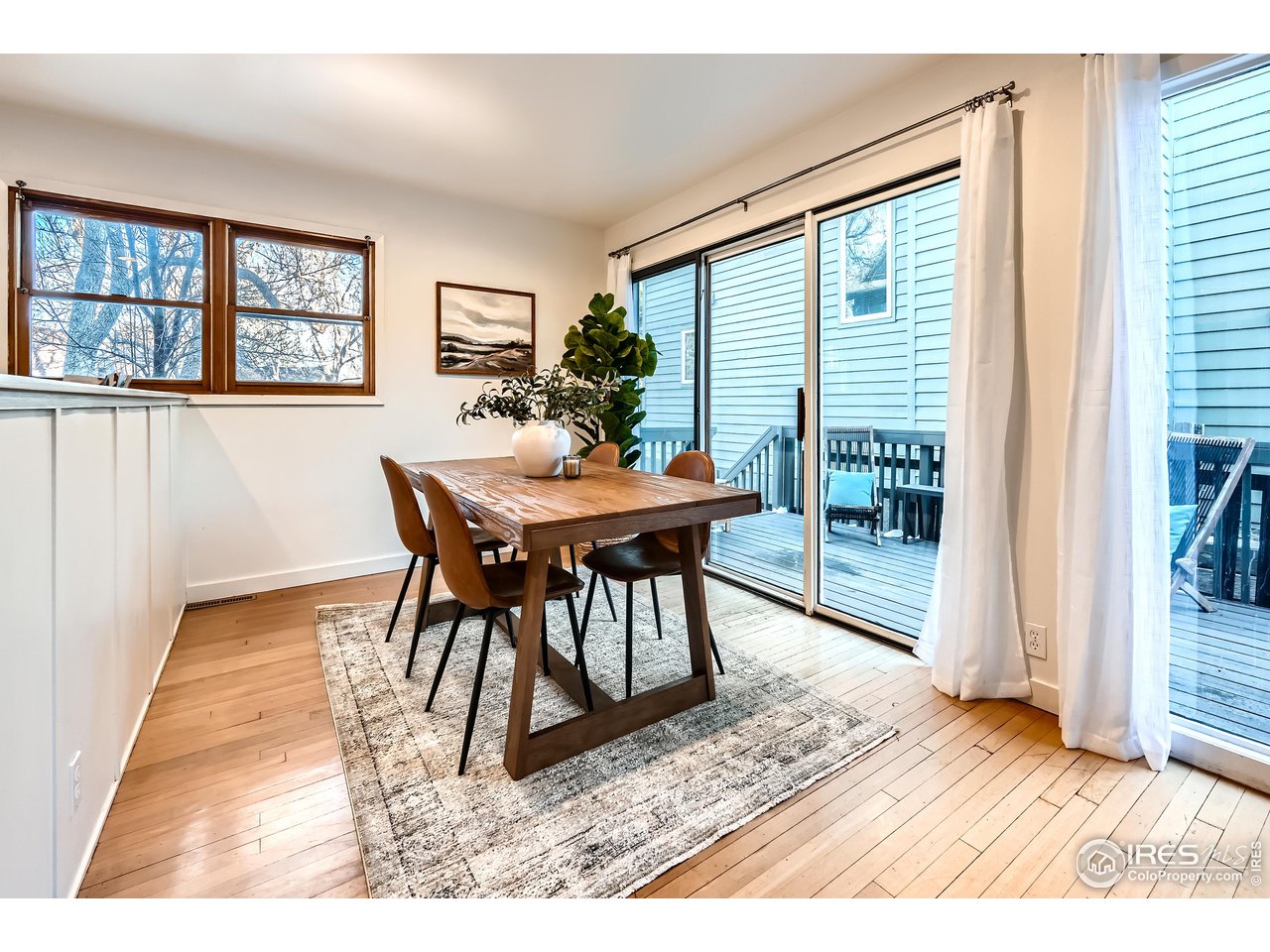 4150 Riverside Avenue Boulder, CO 80304 - Photo 6 of 40 a dining room with furniture and a window