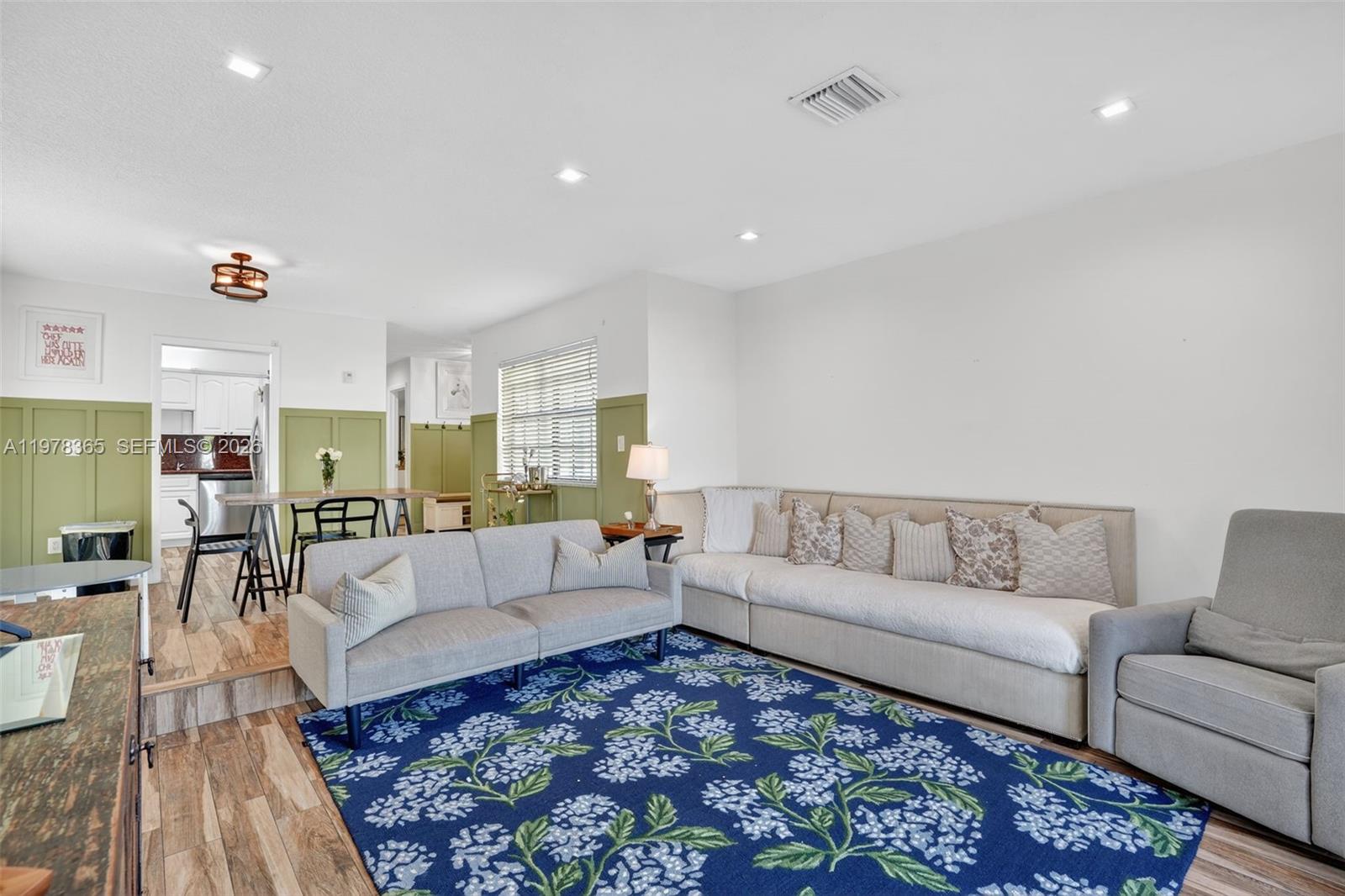 7016 Southwest 103rd Place Miami, FL 33173 - Photo 11 of 21 a living room with furniture and a couch