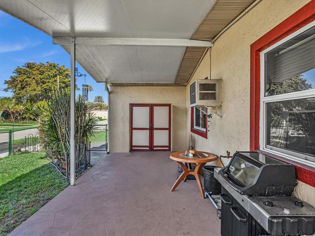 5180 Southwest 13th Street Plantation, FL 33317 - Photo 31 of 54 a room with furniture and window