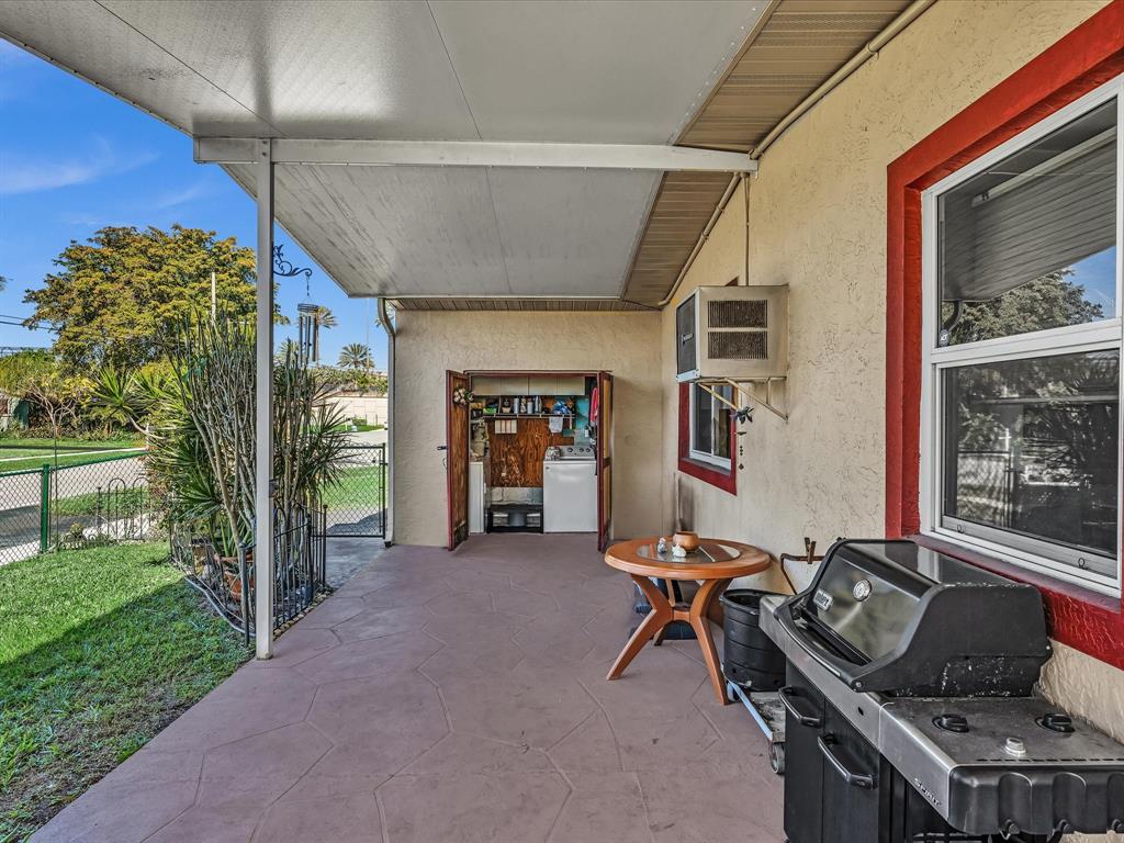 5180 Southwest 13th Street Plantation, FL 33317 - Photo 32 of 54 a living room with furniture and a window